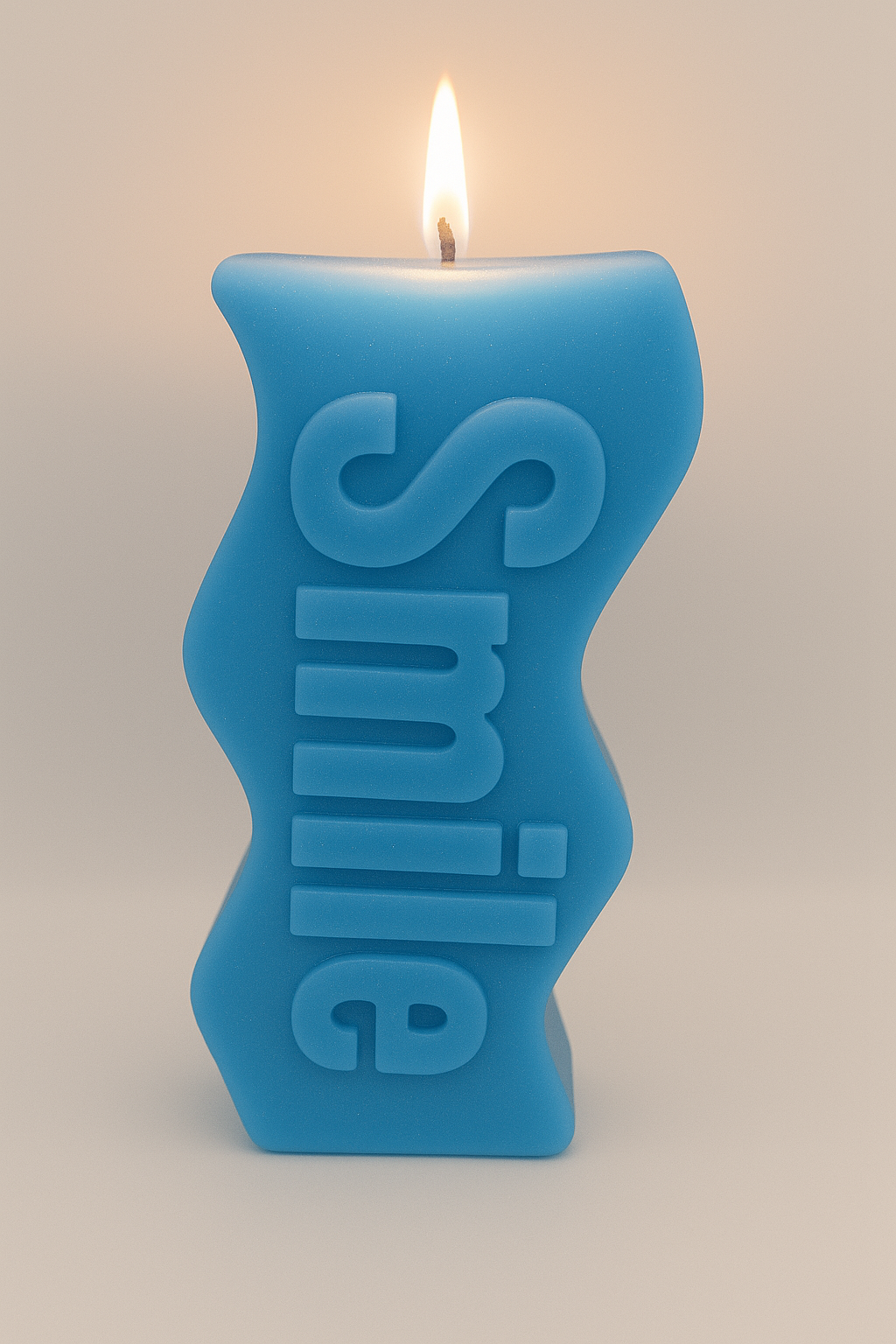 Blue Smile Candle with Smile message in soft blue soy wax, promoting calm and positivity