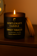Sweet Tobacco Candle in sleek matte black jar with rich, smooth tobacco and vanilla scent