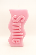 Pink Smile Candle with cheerful smile message in soft pink color for positive ambiance