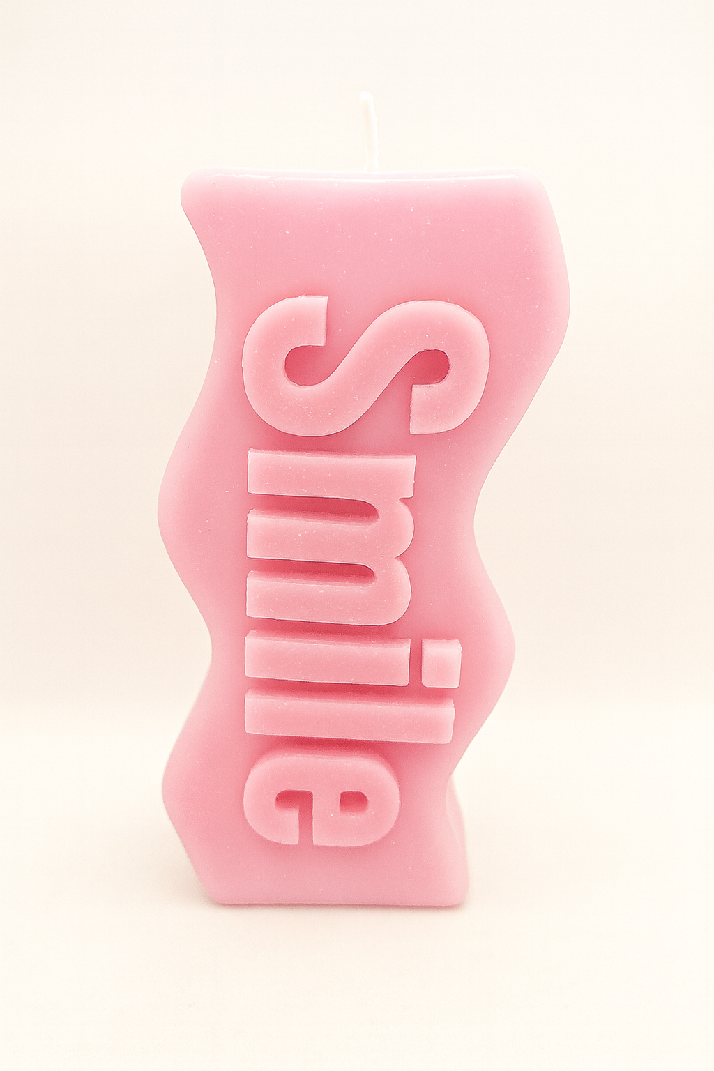 Pink Smile Candle with cheerful smile message in soft pink color for positive ambiance